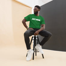Load image into Gallery viewer, The perfect gift for drummers — the Just Drum Tee in green from Drum Club Global. Premium unisex fit with bold JUST DRUM print. Rep the culture. Ships from Nashville, TN.