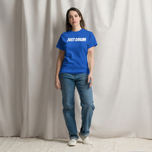 Load image into Gallery viewer, Rep the culture in blue. The Drum Club Global Just Drum Tee features a bold JUST DRUM chest print on a premium blue unisex tee. The perfect drummer gift. Ships from Nashville, TN.
