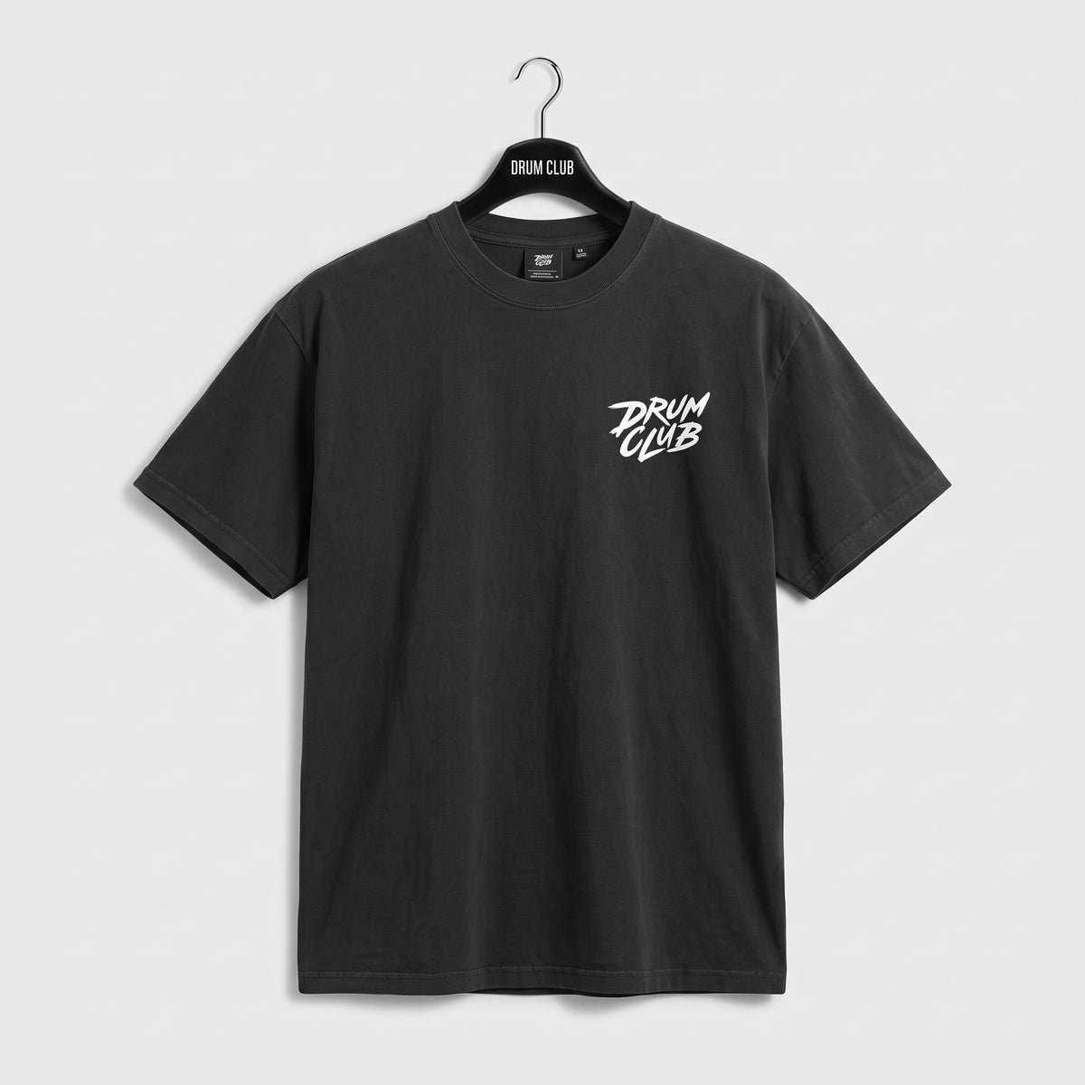 Charcoal Drum Club T-shirt with a small white logo on the left chest, front view.
