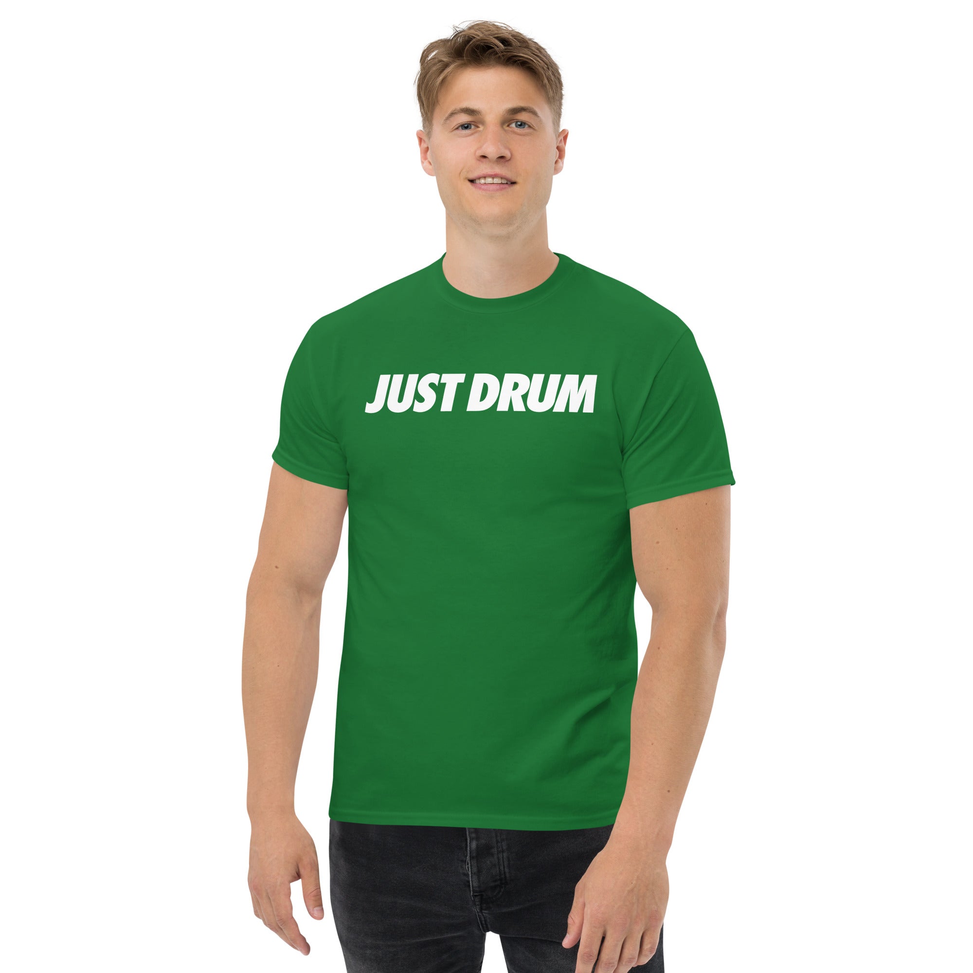 Drum Club Global Just Drum Tee in green — wear your passion every day. Unisex drummer t-shirt with bold chest print built for the serious musician. Shop drumclubglobal.com