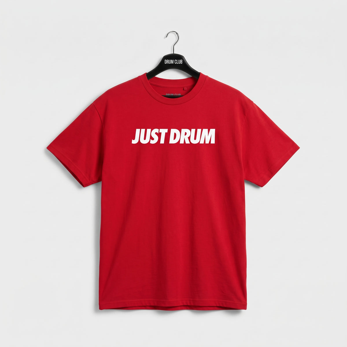 Red Drum Club T-shirt with white Just Drum lettering across the chest, front view.